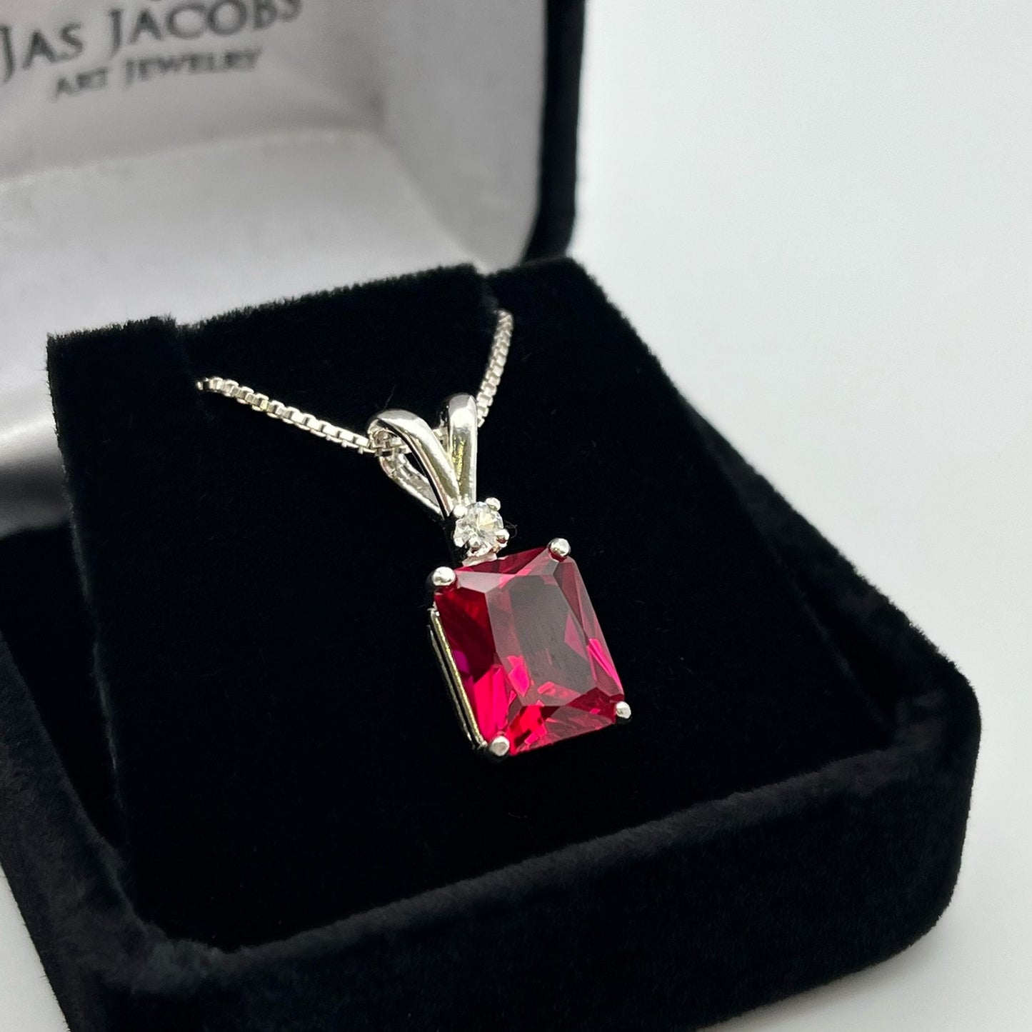 Beautiful Emerald Cut Ruby Necklace with White Sapphire accent