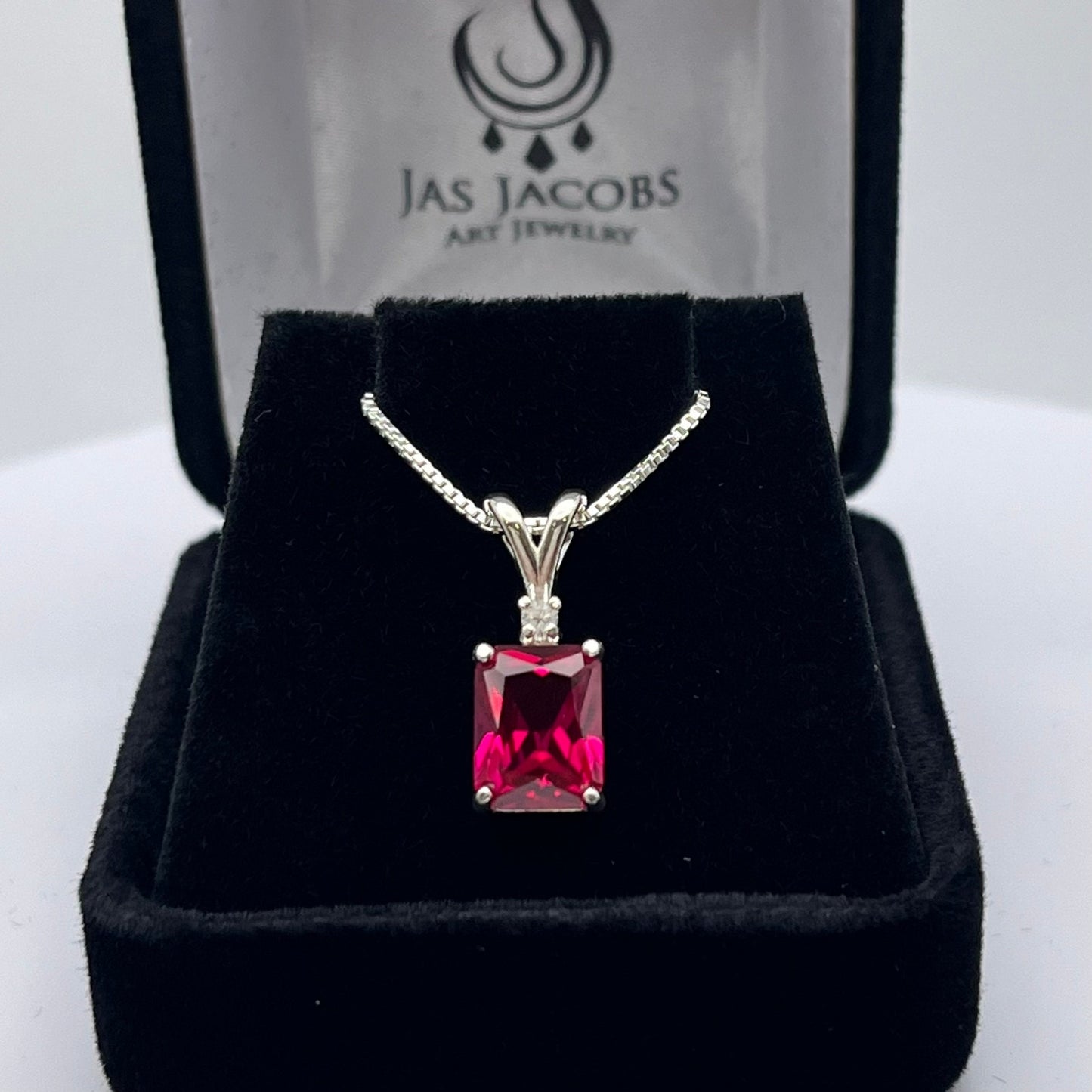Beautiful Emerald Cut Ruby Necklace with White Sapphire accent
