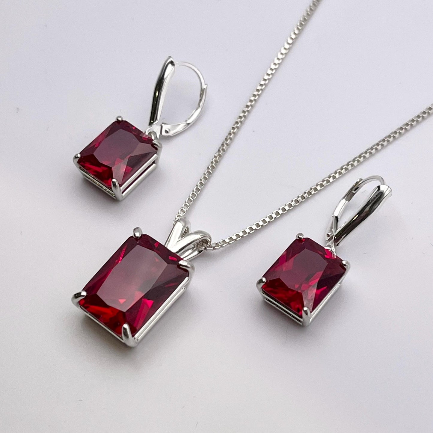 Gorgeous 27ctw Emerald Cut Ruby Necklace & Earrings Set in Sterling Silver