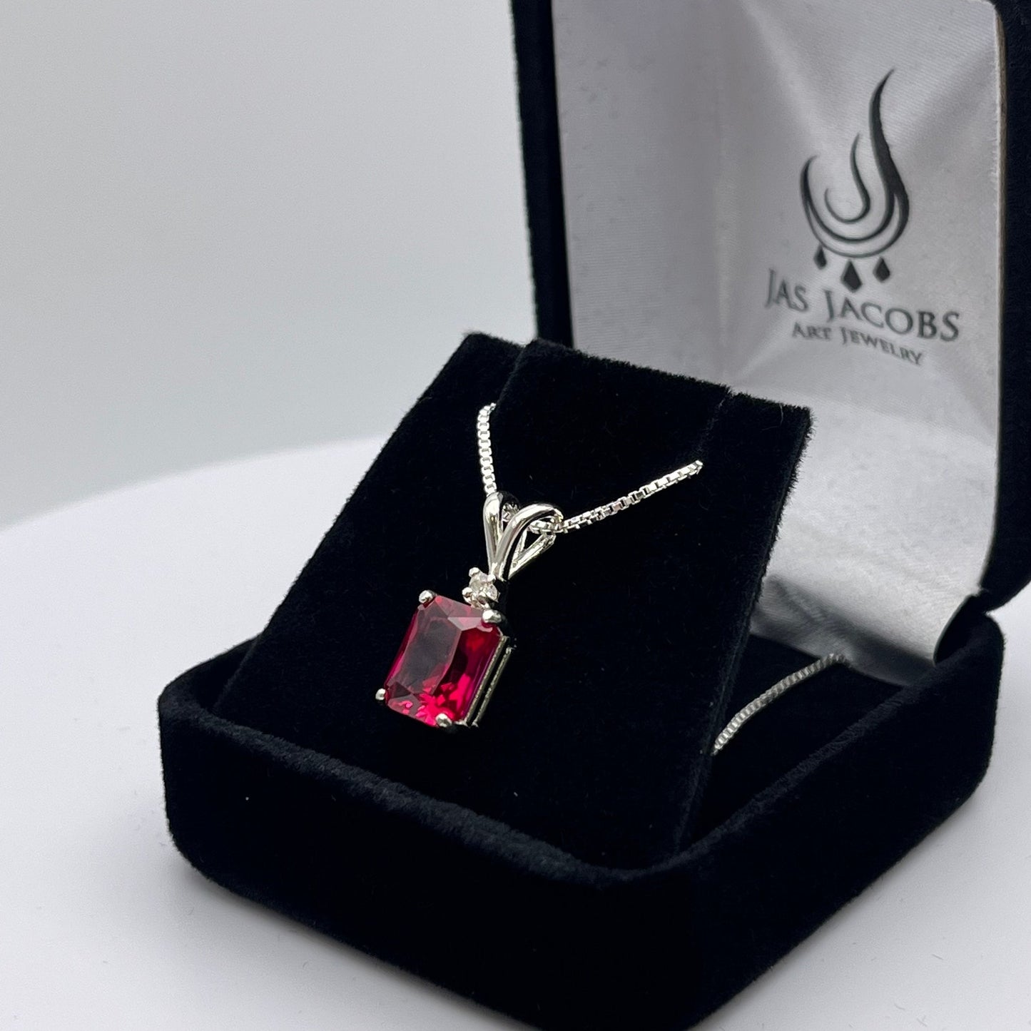 Beautiful Emerald Cut Ruby Necklace with White Sapphire accent