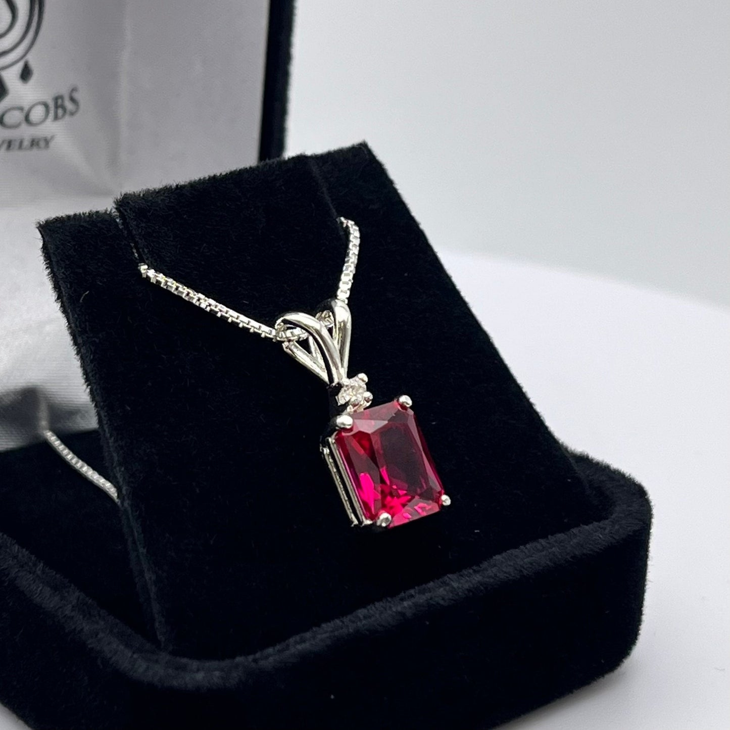 Beautiful Emerald Cut Ruby Necklace with White Sapphire accent