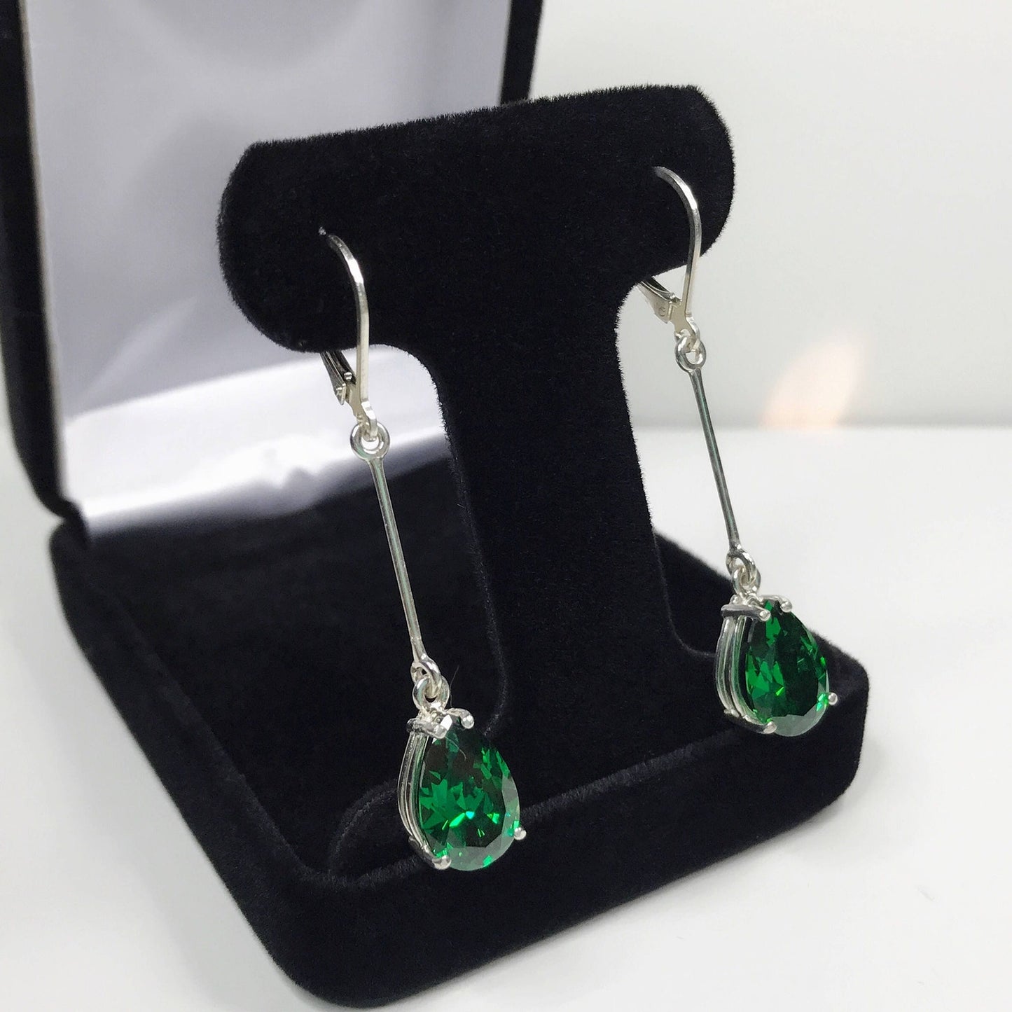 Beautiful 7ctw Pear Cut Emerald Earrings