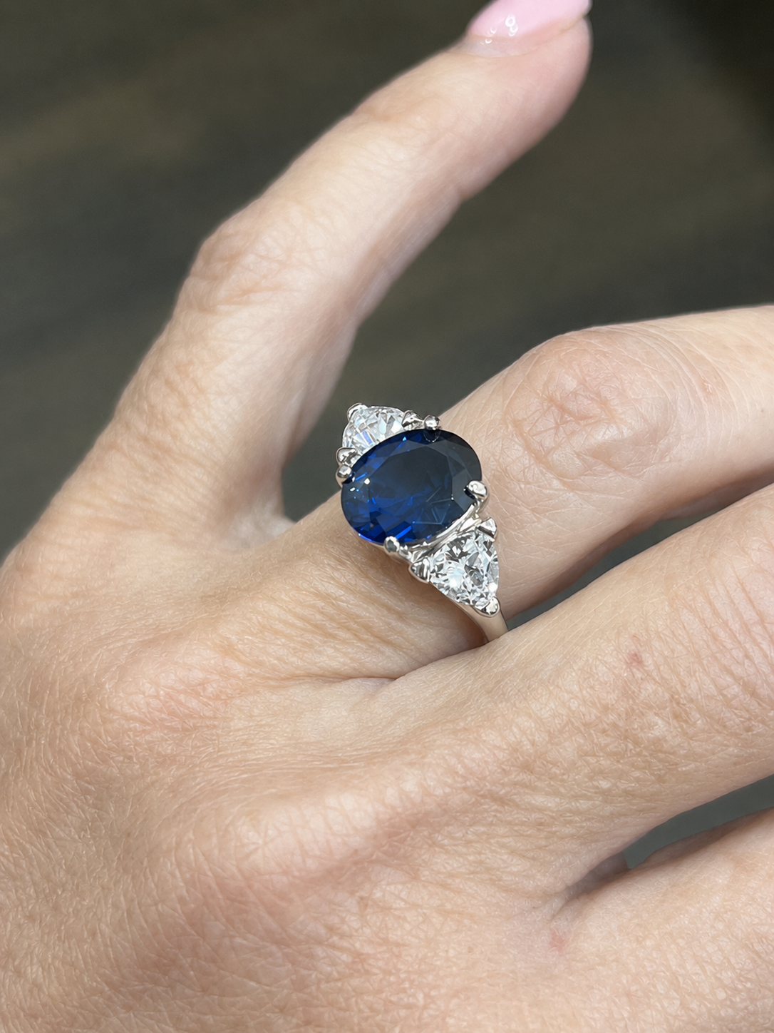 4.5ctw Oval Cut Blue Sapphire Three Stone Ring | Trillion Cut White Sapphires