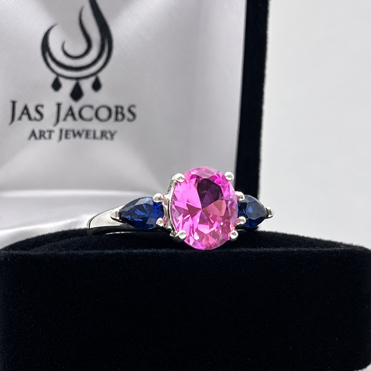 4.5ctw Oval Cut Pink & Blue Sapphire Three-Stone Ring