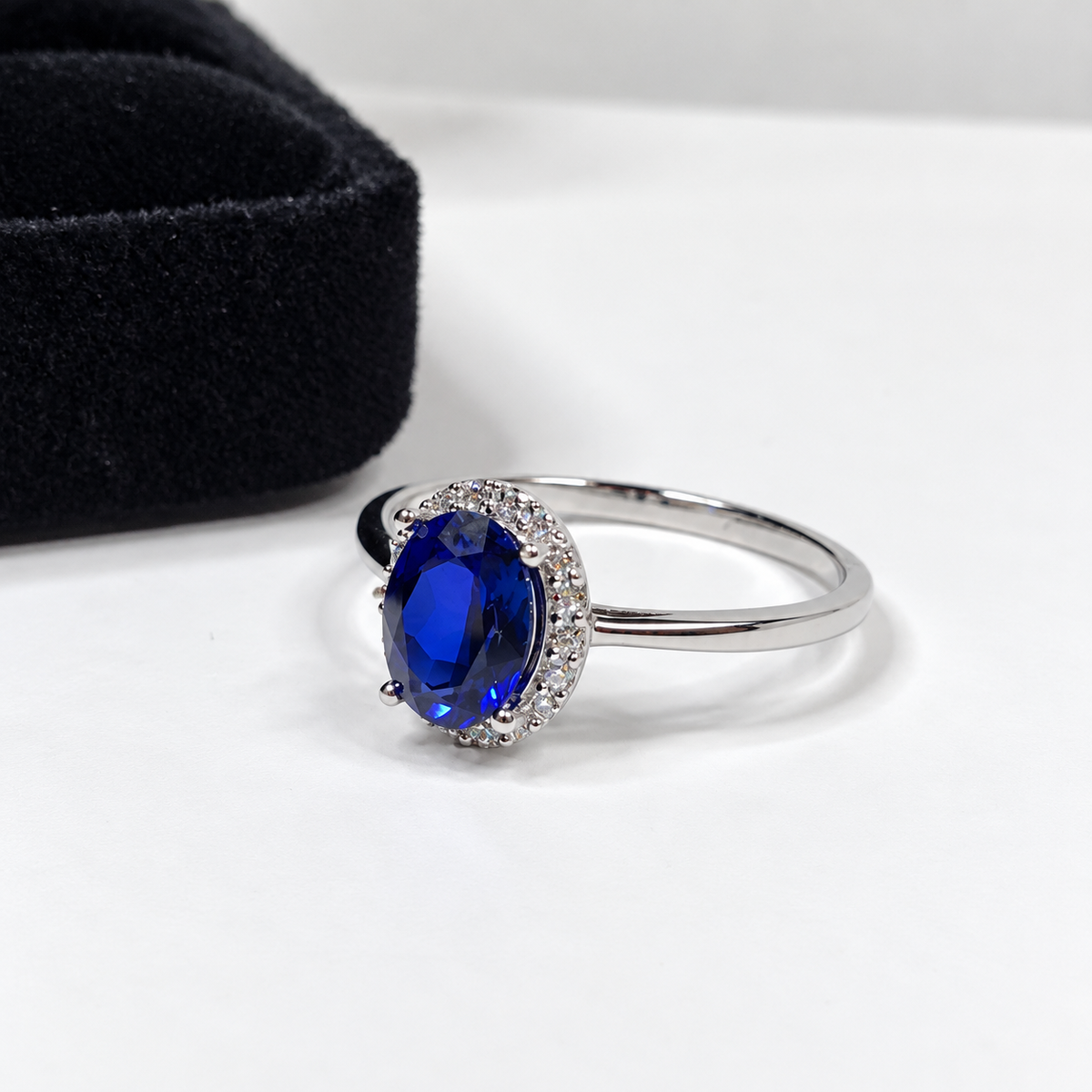 1.5ct Oval Royal Blue Sapphire Halo Ring