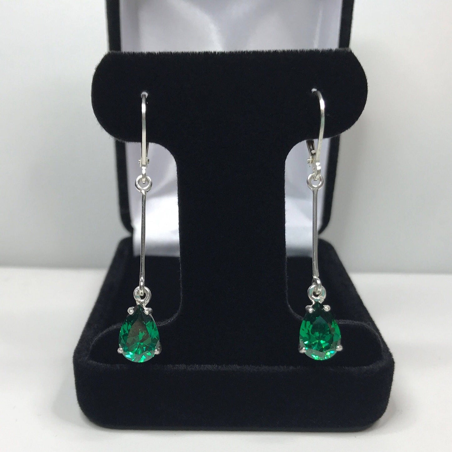 Beautiful 4ctw Pear Cut Emerald Earrings