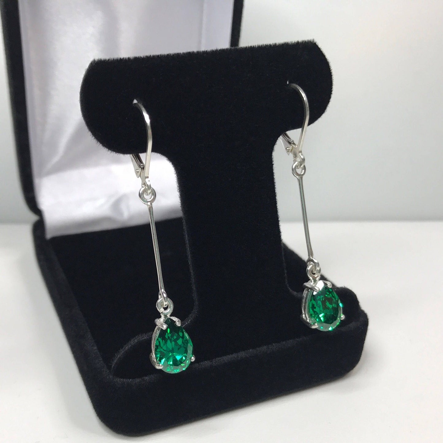 Beautiful 4ctw Pear Cut Emerald Earrings
