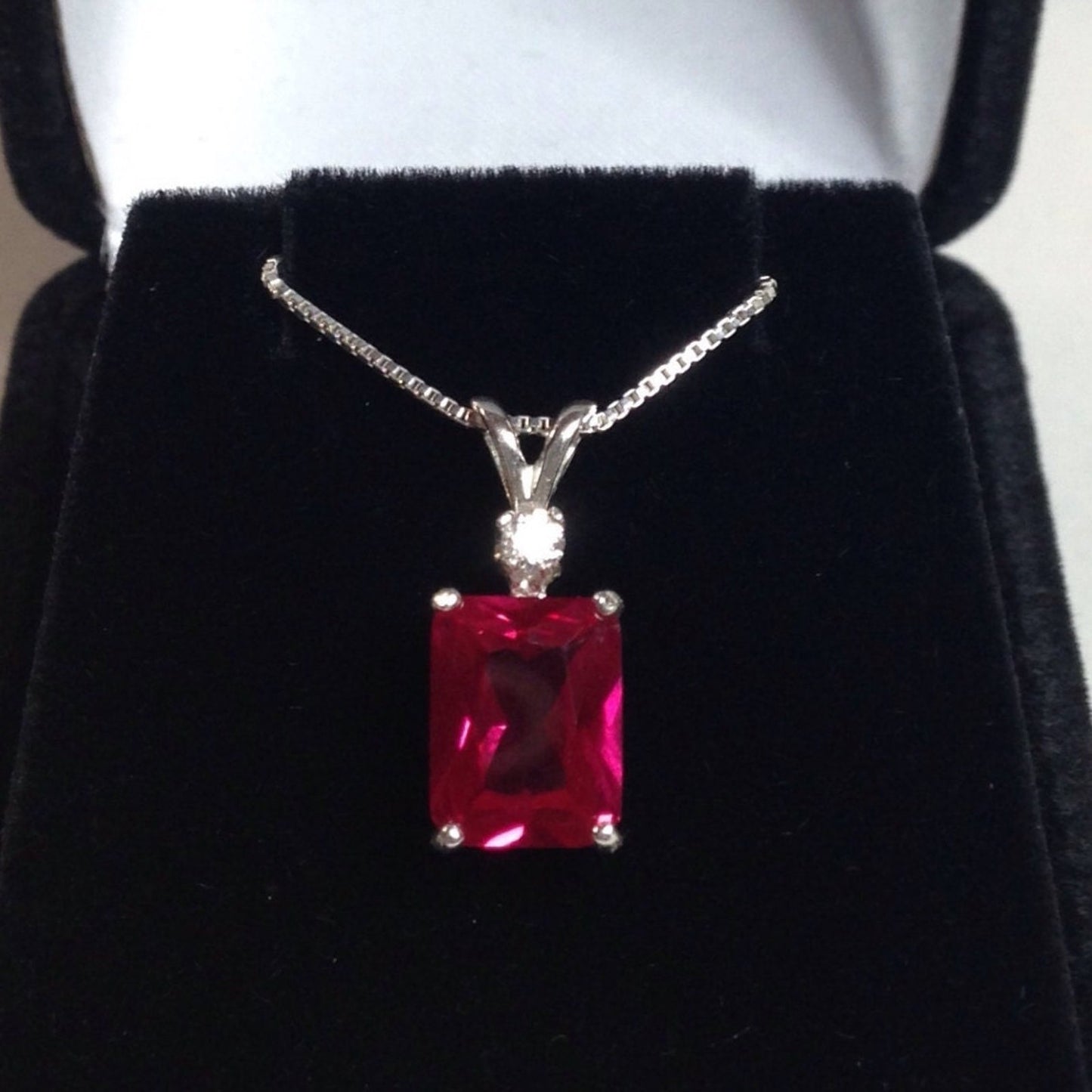 Beautiful Emerald Cut Ruby Necklace with White Sapphire accent