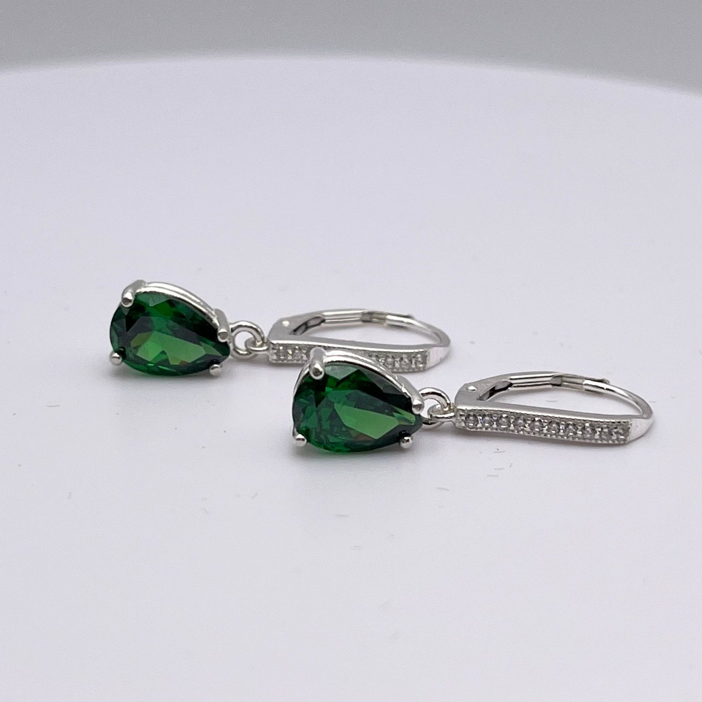Beautiful 5ctw Pear Cut Emerald Earrings with White Sapphire Accents set in Sterling Silver
