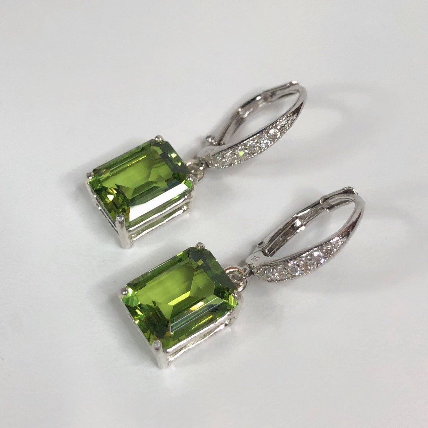 Beautiful 7.3ctw Emerald Cut Peridot Earrings with White Sapphire Accents in Sterling Silver