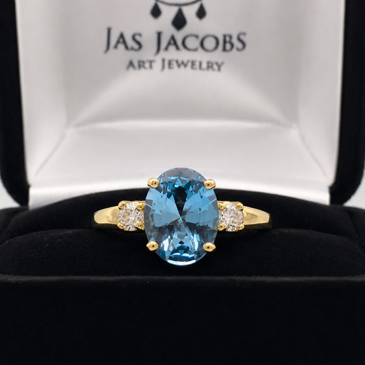 2.6CTW Oval Cut Blue Topaz Ring | White Sapphire Accents