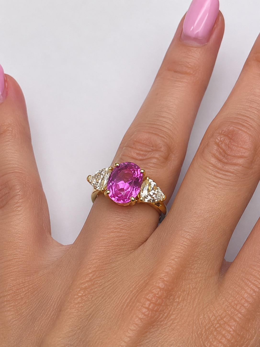 Vivid Pink Sapphire & White Sapphire Three-Stone Ring