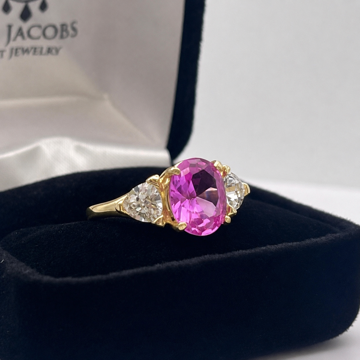 Vivid Pink Sapphire & White Sapphire Three-Stone Ring