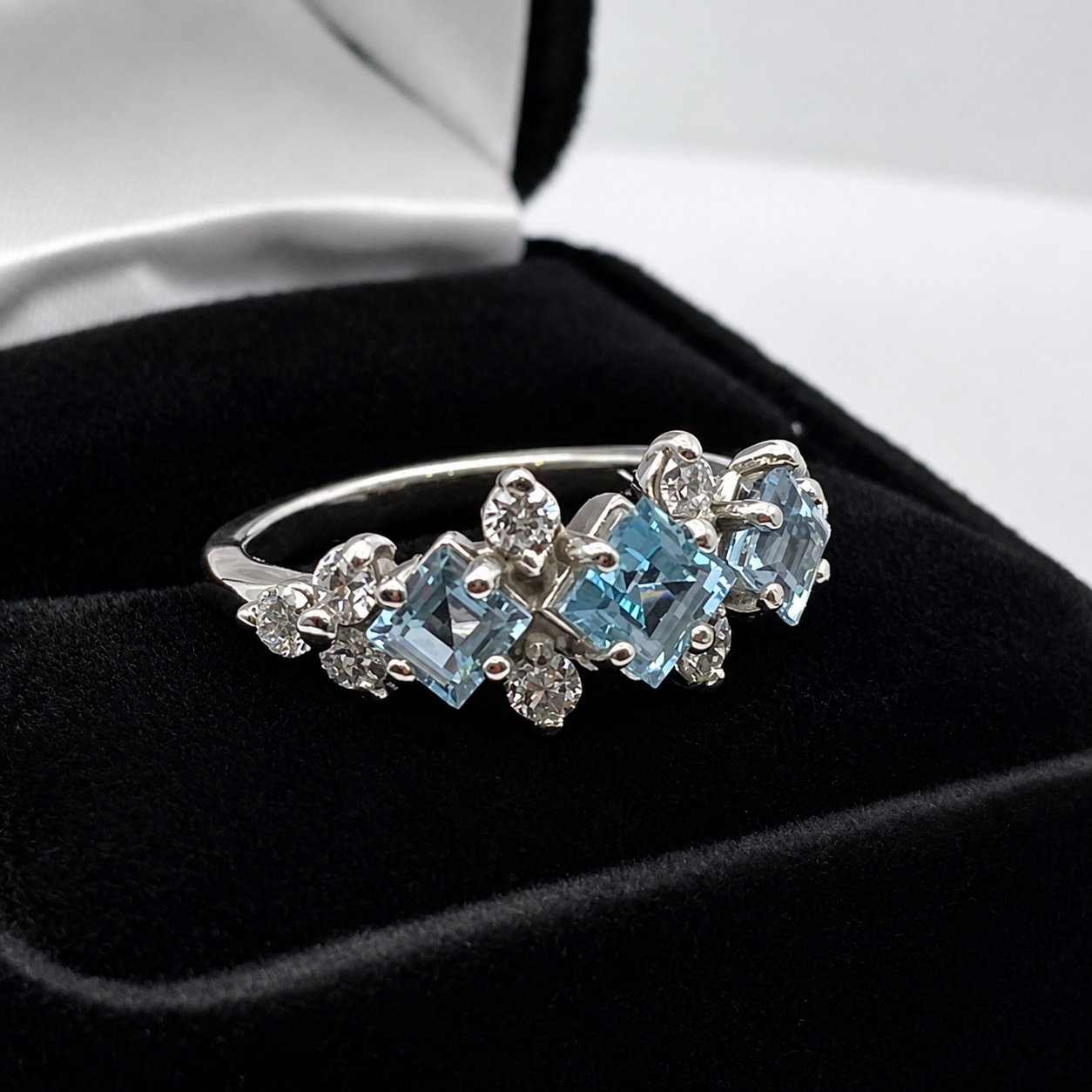 Art Deco Inspired Princess Cut Sky Blue Topaz Three Stone Ring