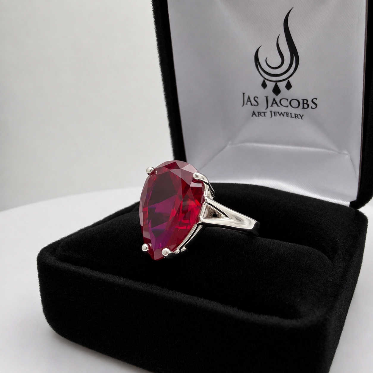 7.5ct Pear Cut Ruby Cathedral Solitaire Ring