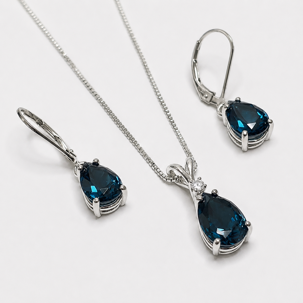 7ctw Pear Cut London Blue Spinel & White Topaz Necklace & Earrings Set