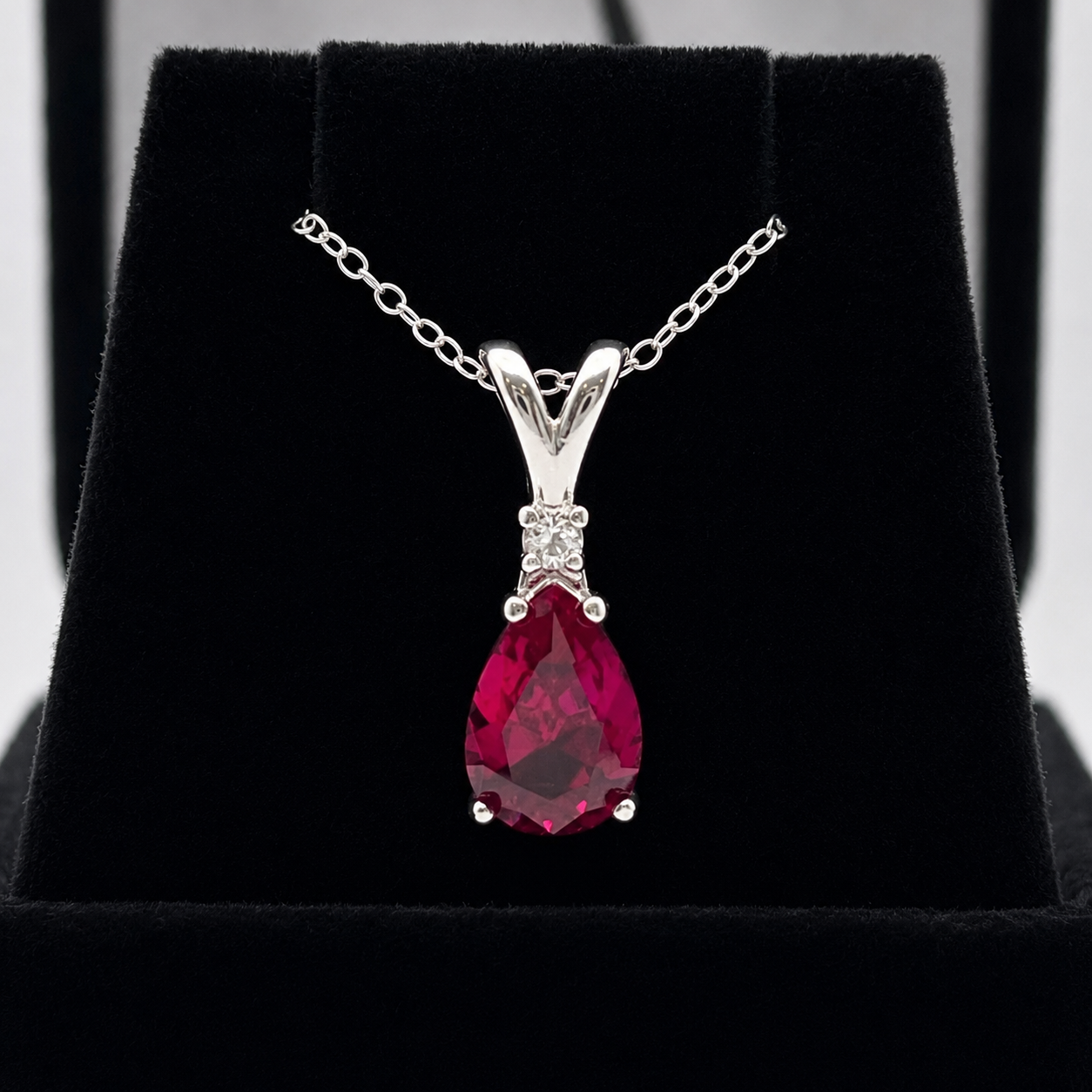 2.2CT Pear Cut Ruby Pendant Necklace | Diamond Accent