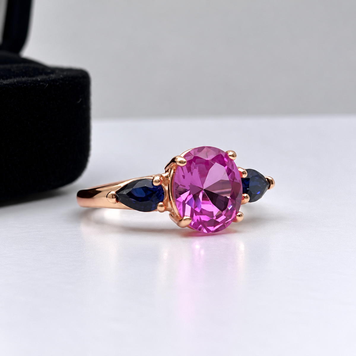 4.5ctw Oval Cut Pink & Blue Sapphire Three-Stone Ring