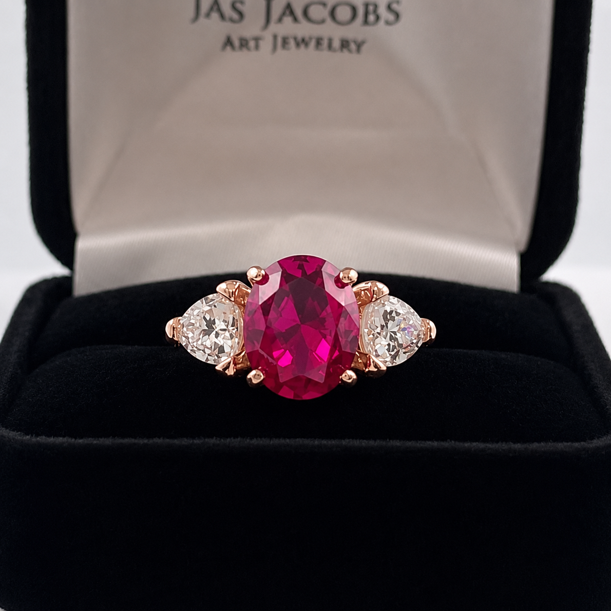 4.5ctw Oval Cut Ruby & Trillion Cut White Sapphire Three Stone Ring