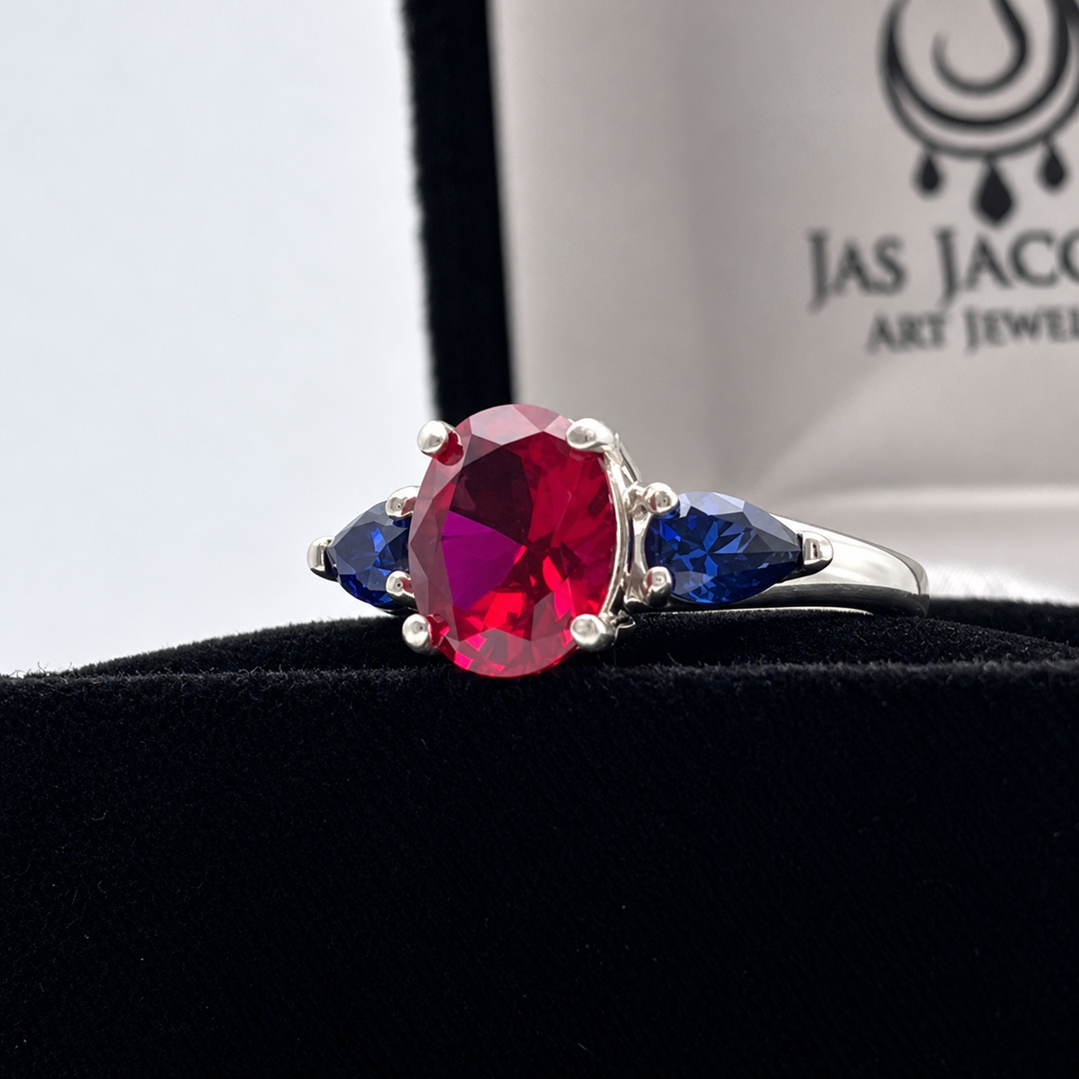 4.5ctw Oval Ruby & Blue Sapphire Three-Stone Statement Ring