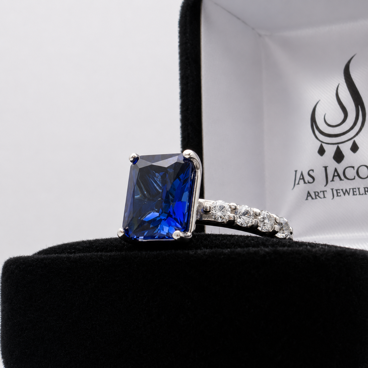 4.64 Carat Emerald Cut Blue Sapphire Ring with Diamond Accents