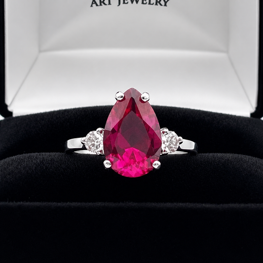 4.7CTW Pear Cut Ruby Ring with White Sapphire Accents