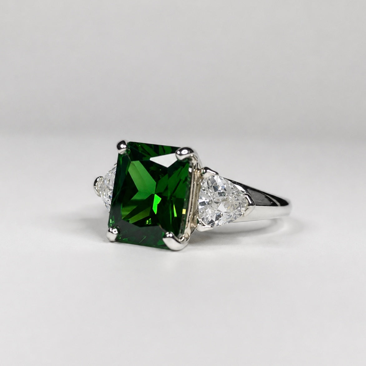 4.5CTW Emerald Cut Emerald Ring | Trillion White Sapphire Three Stone Ring