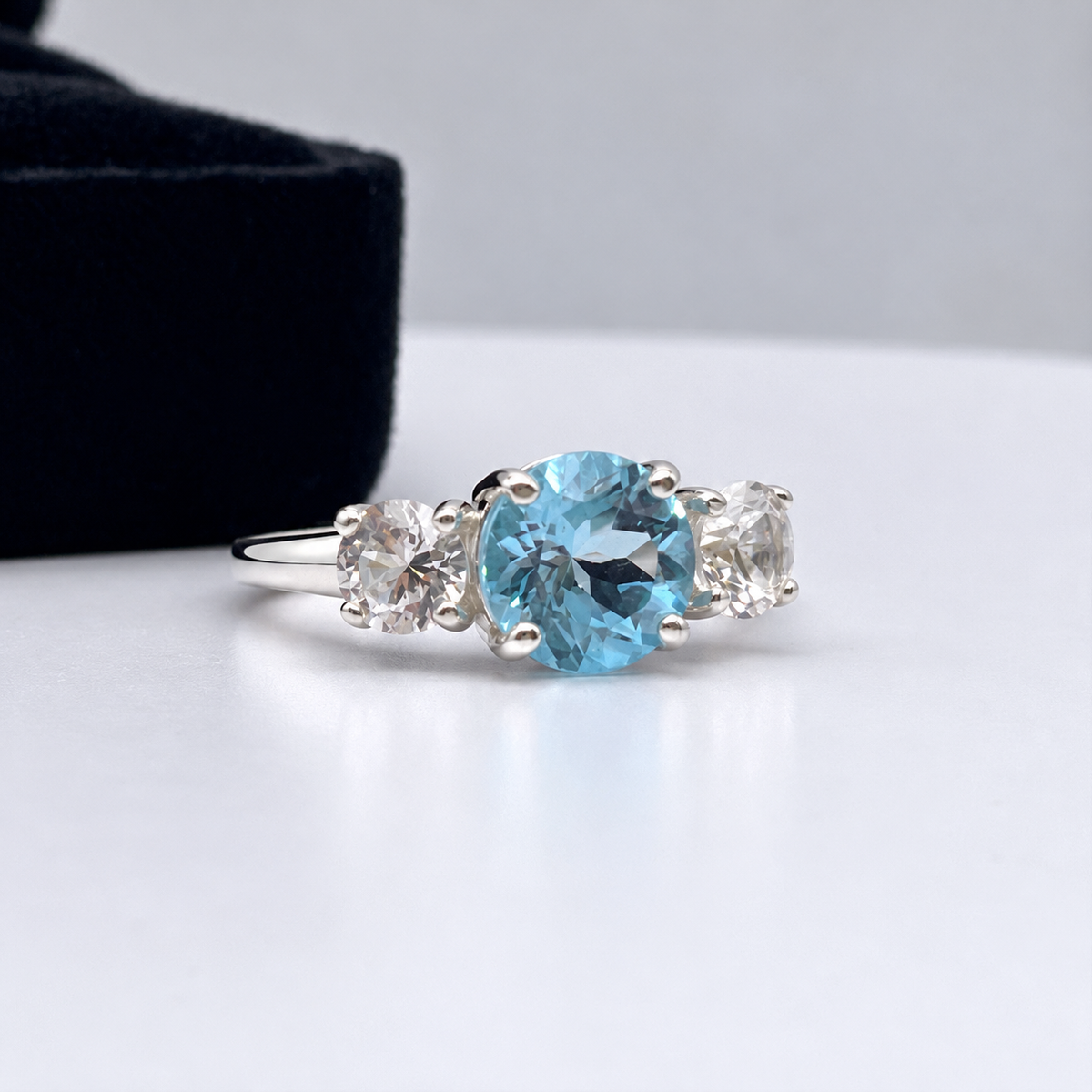 4ct Sky Blue Topaz & White Sapphire Three Stone Ring