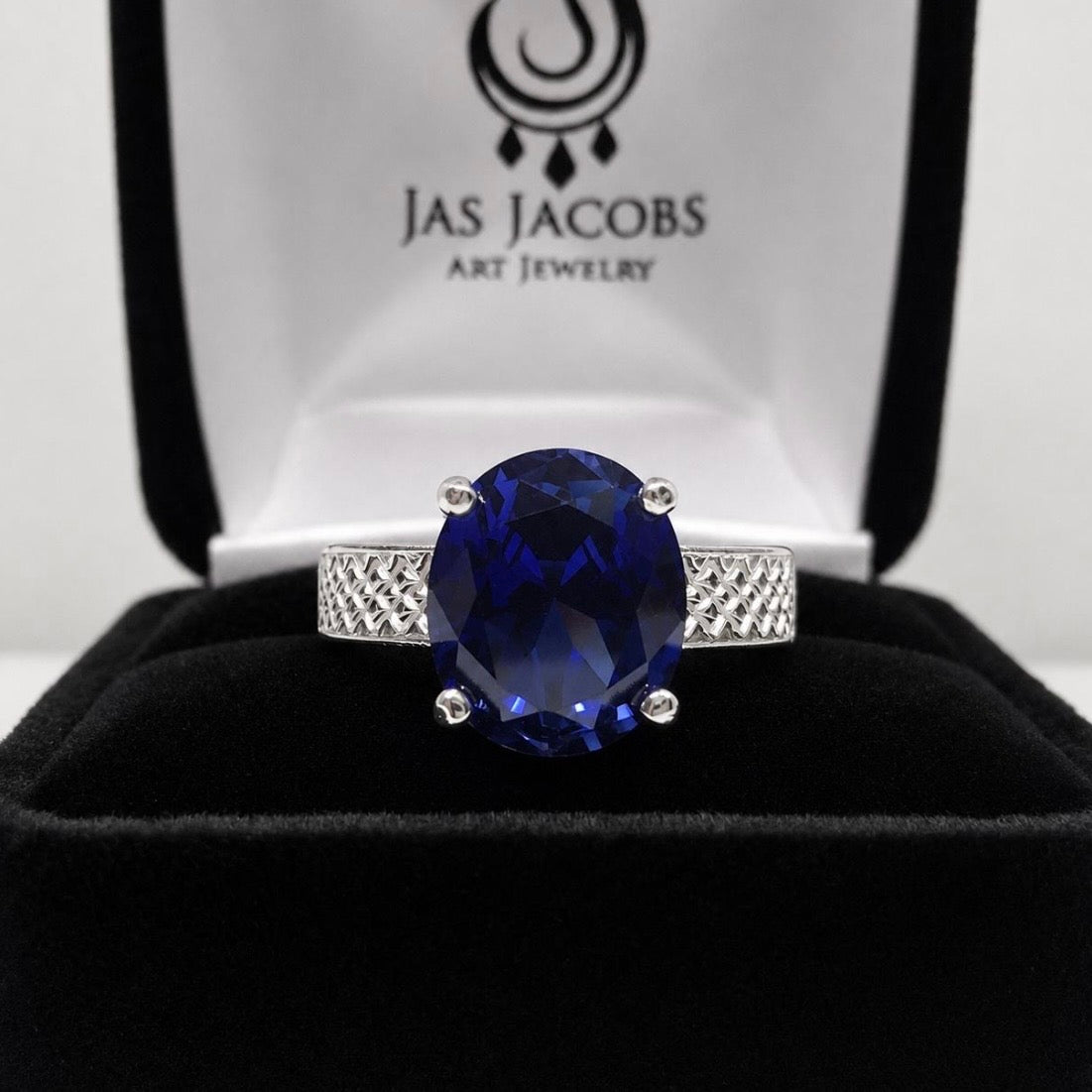12x10 Blue Sapp Solitaire carved band