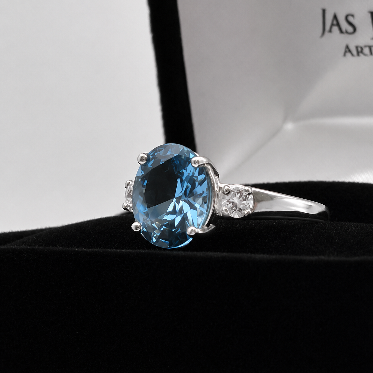 2.6CTW Oval Cut Blue Topaz Ring | White Sapphire Accents
