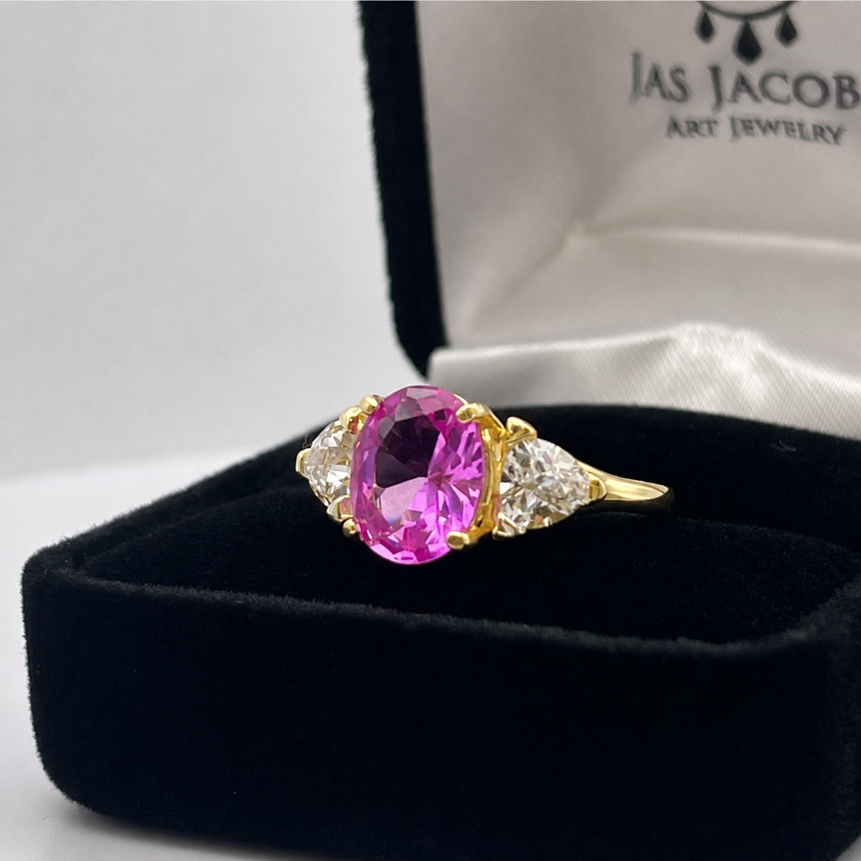 Vivid Pink Sapphire & White Sapphire Three-Stone Ring