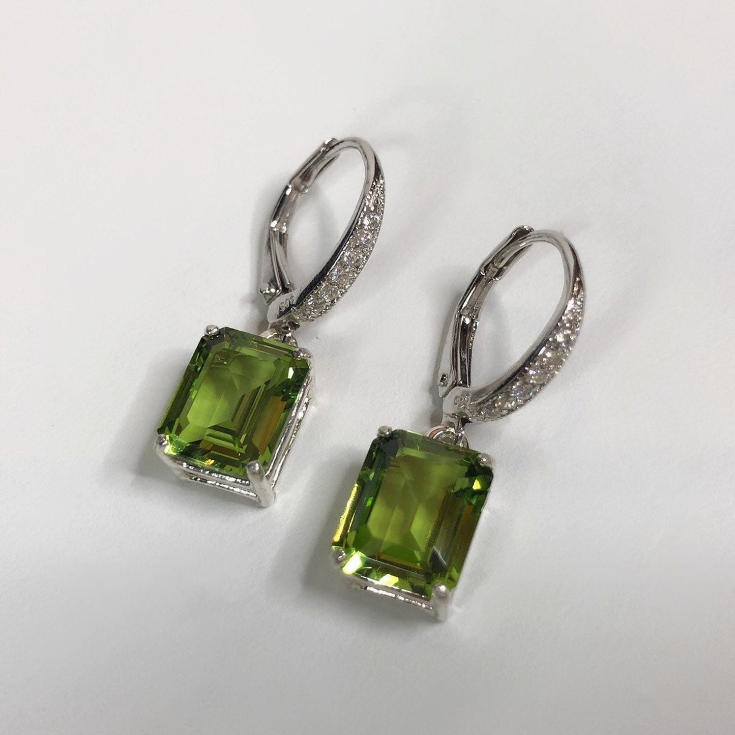 Beautiful 7.3ctw Emerald Cut Peridot Earrings with White Sapphire Accents in Sterling Silver