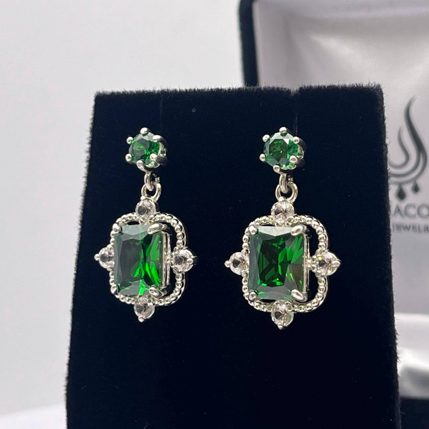 Gorgeous 10.4ctw Emerald Cut Emerald Earrings White Sapphire Accents