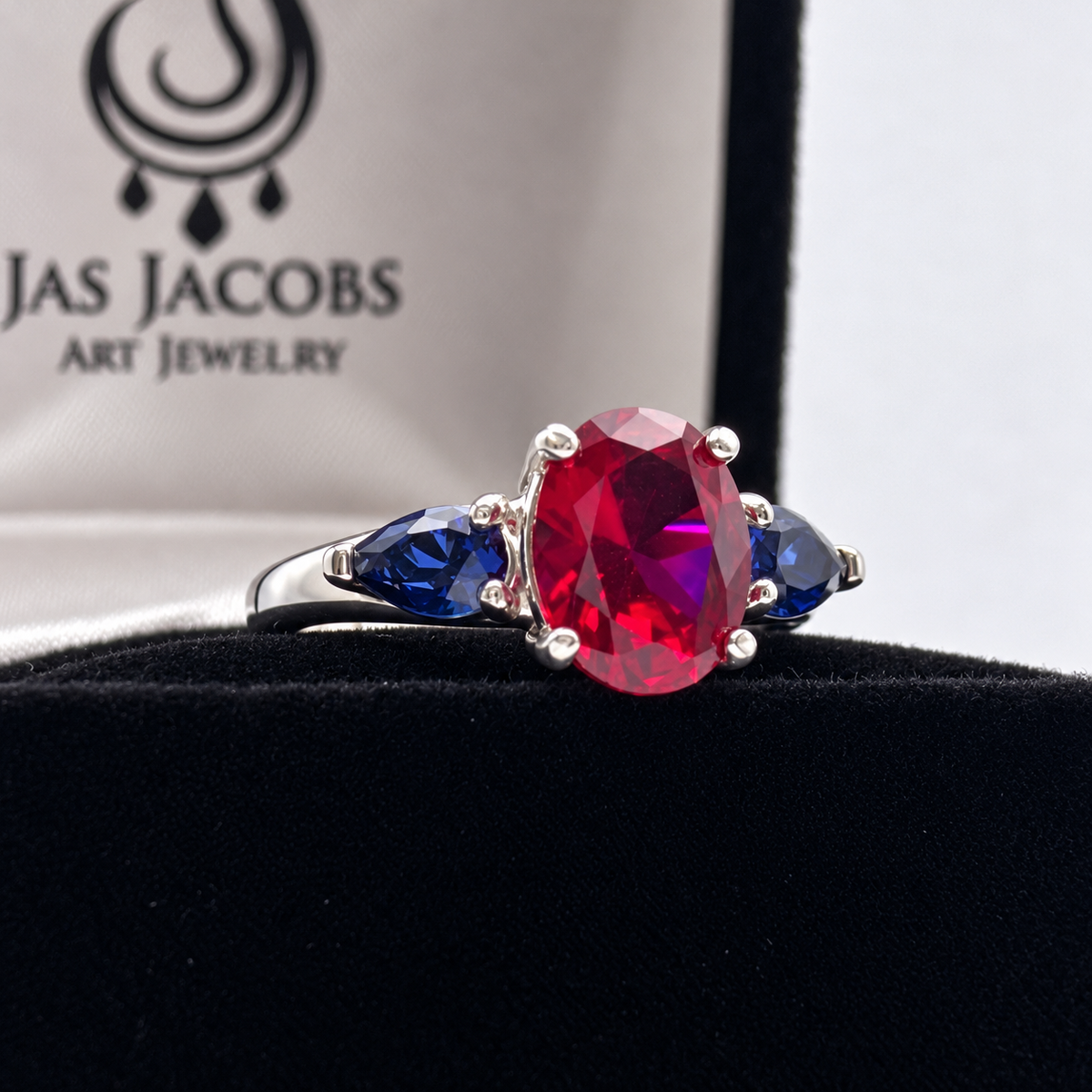 4.5ctw Oval Ruby & Blue Sapphire Three-Stone Statement Ring