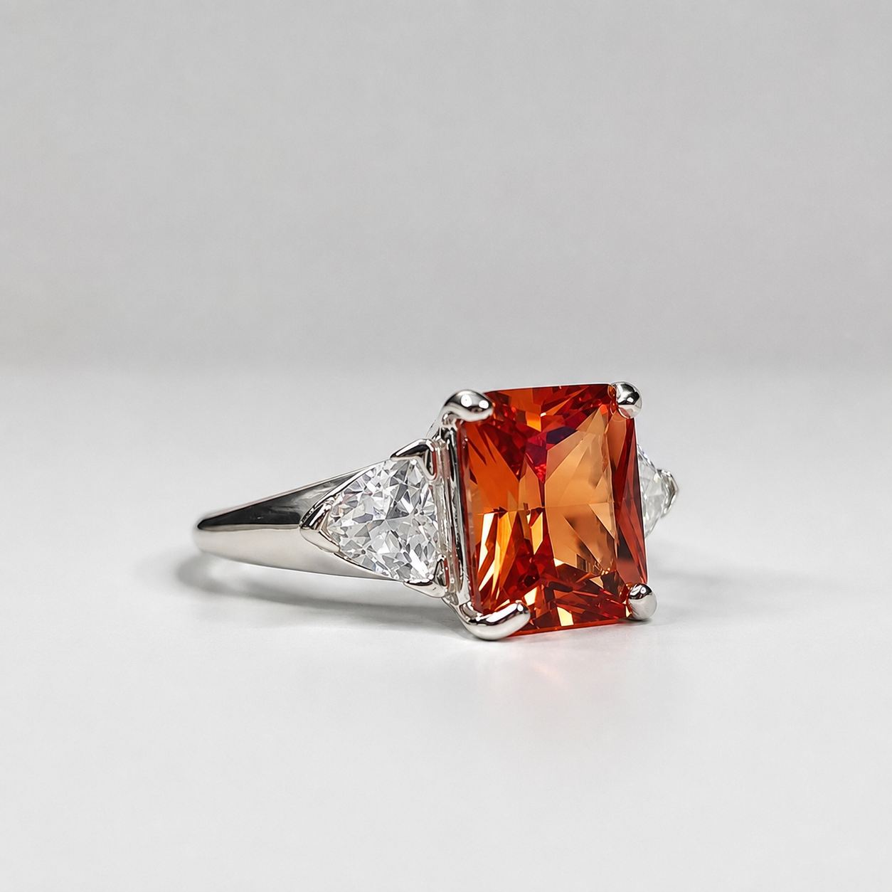 5.5ct Emerald Cut Padparadscha Sapphire Ring | Trillion Cut White Sapphire Three Stone Ring