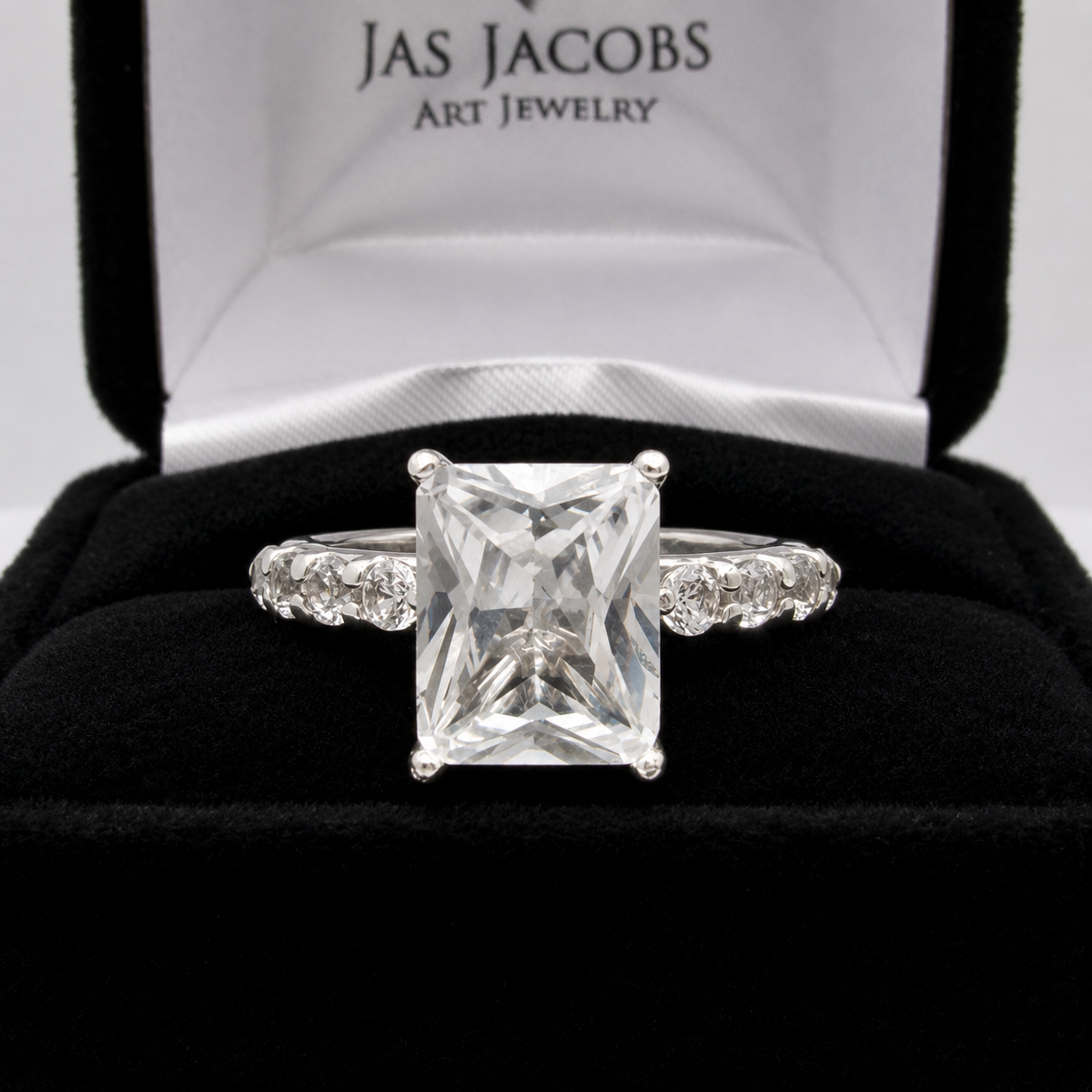 4CT Emerald Cut White Sapphire Ring | 0.64 CTW Diamond Accent Engagement Ring
