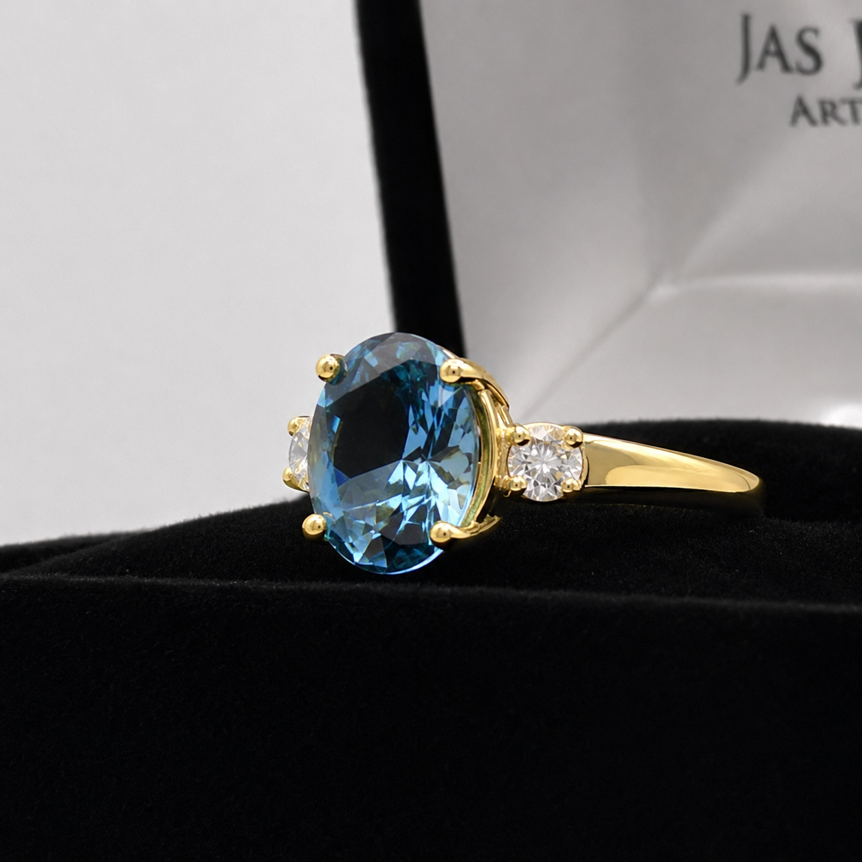 2.6CTW Oval Cut Blue Topaz Ring | White Sapphire Accents