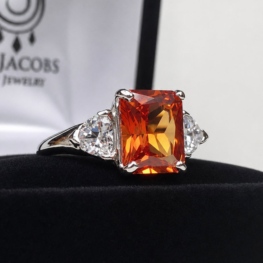 5.5ct Emerald Cut Padparadscha Sapphire Ring | Trillion Cut White Sapphire Three Stone Ring