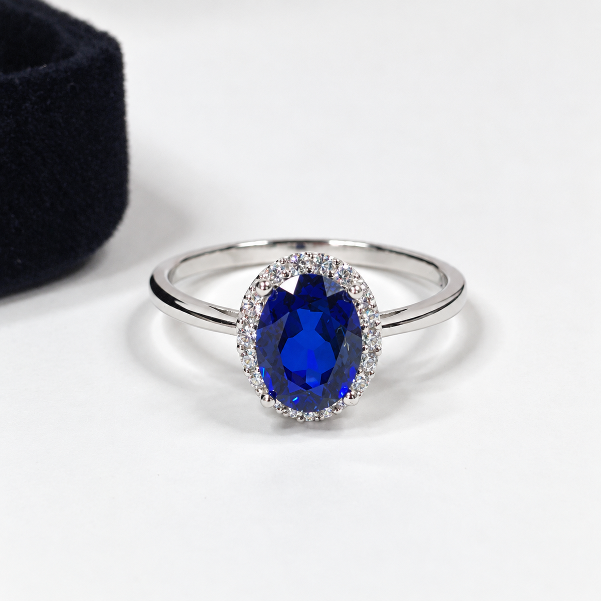 1.5ct Oval Royal Blue Sapphire Halo Ring