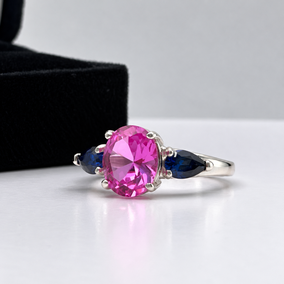4.5ctw Oval Cut Pink & Blue Sapphire Three-Stone Ring