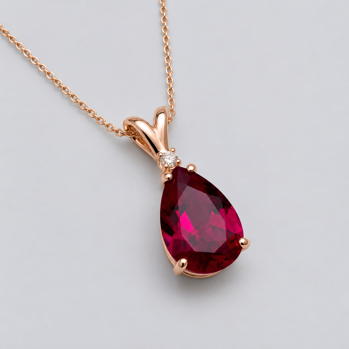 7.5ct Pear Cut Ruby Pendant Necklace with White Sapphire Accent