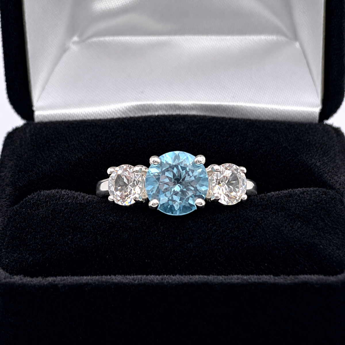 4ct Sky Blue Topaz & White Sapphire Three Stone Ring