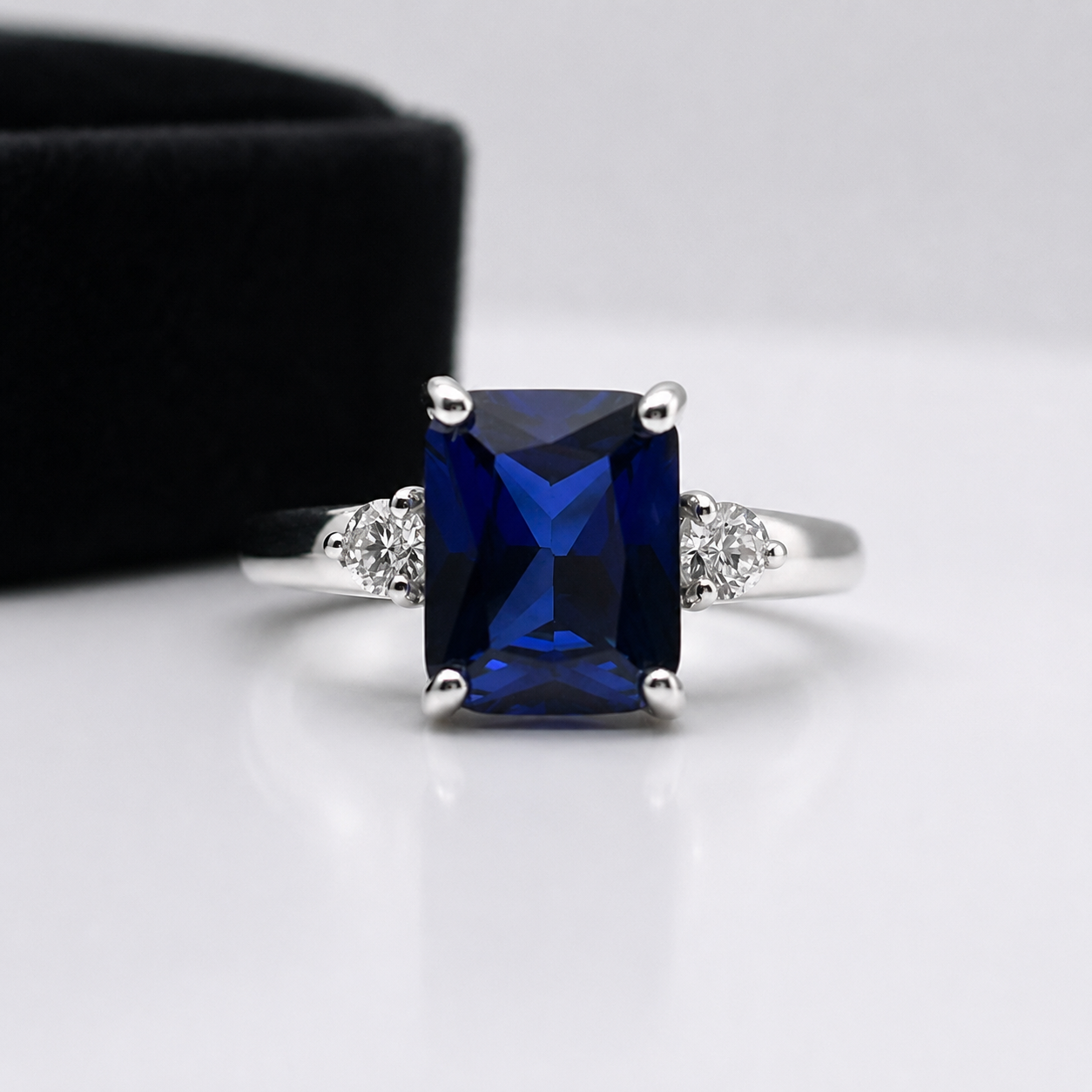 4 Carat Emerald Cut Blue Sapphire Ring with Diamond Accents