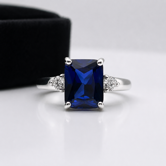 4 Carat Emerald Cut Blue Sapphire Ring with Diamond Accents