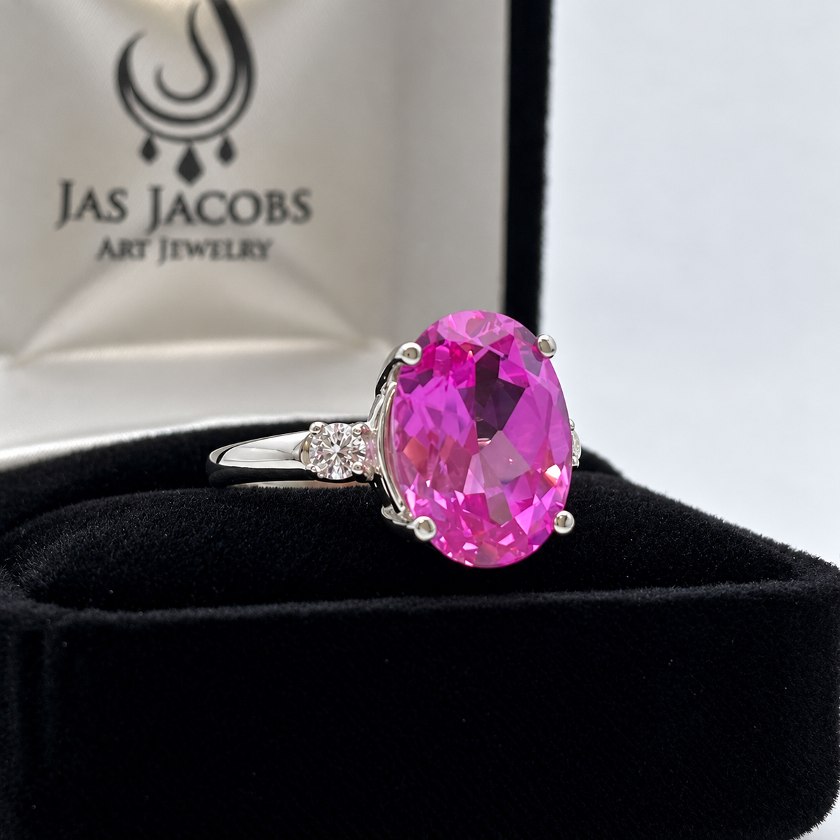 7.26ctw Oval Pink Sapphire & White Sapphire Ring