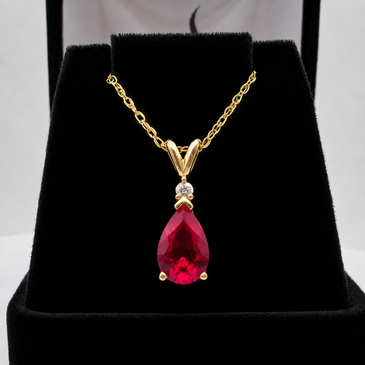 2.2CT Pear Cut Ruby Pendant Necklace | Natural Diamond Accent