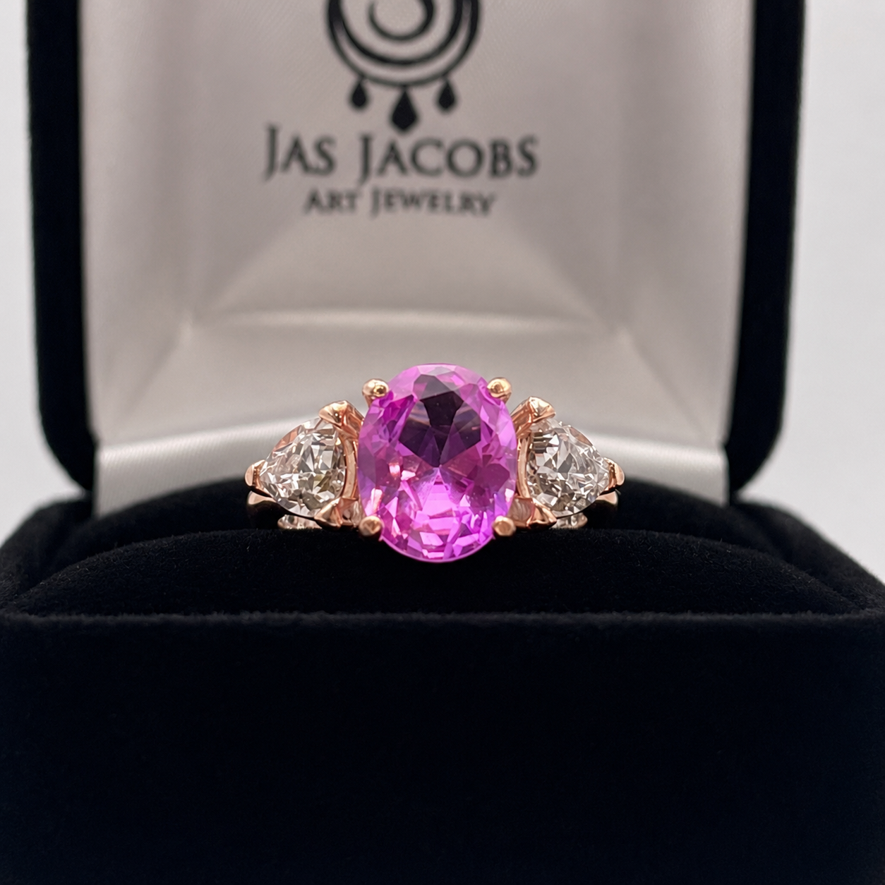 Vivid Pink Sapphire & White Sapphire Three-Stone Ring