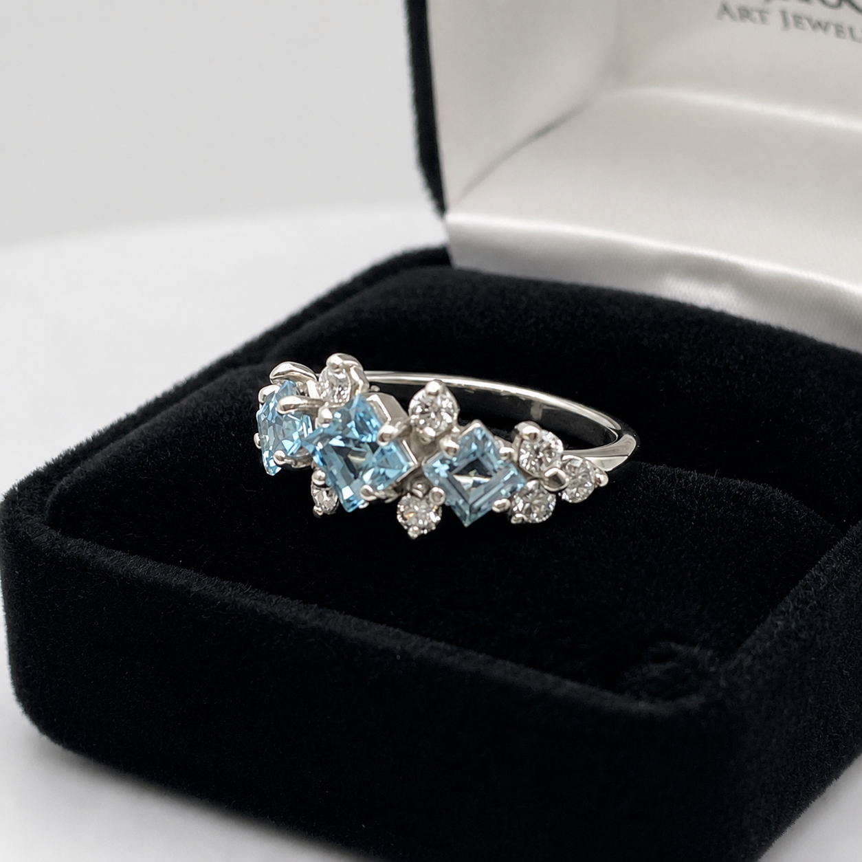 Art Deco Inspired Princess Cut Sky Blue Topaz Three Stone Ring