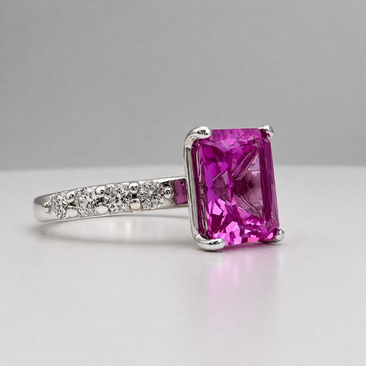 4.64CTW Emerald Cut Pink Sapphire Ring with 8 Brilliant Diamond Accents