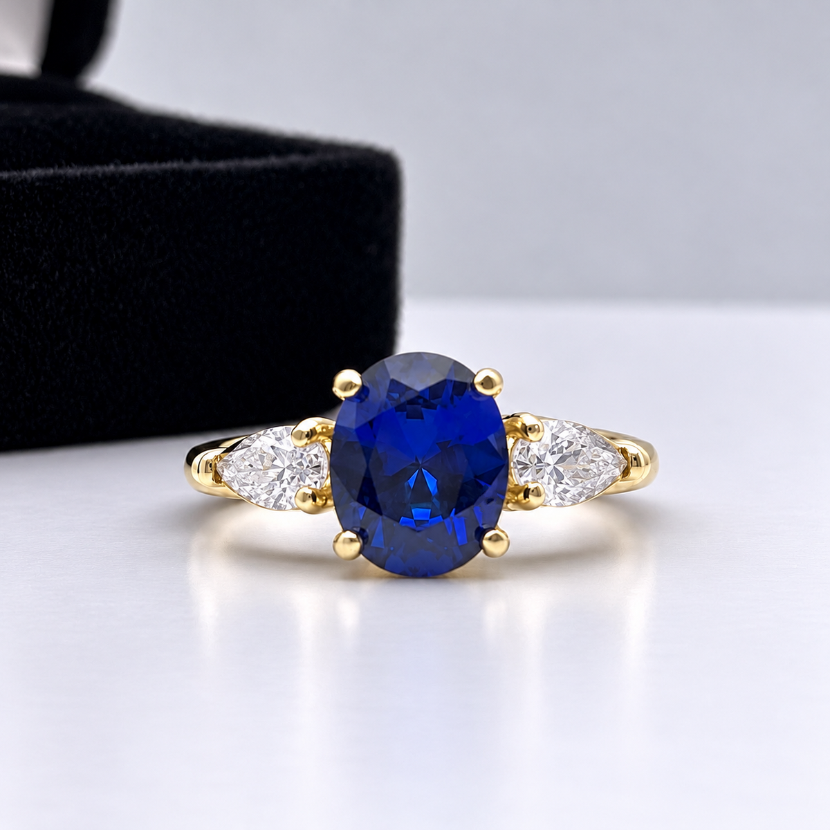 4.5ctw Oval Blue Sapphire & Diamond Three Stone Ring